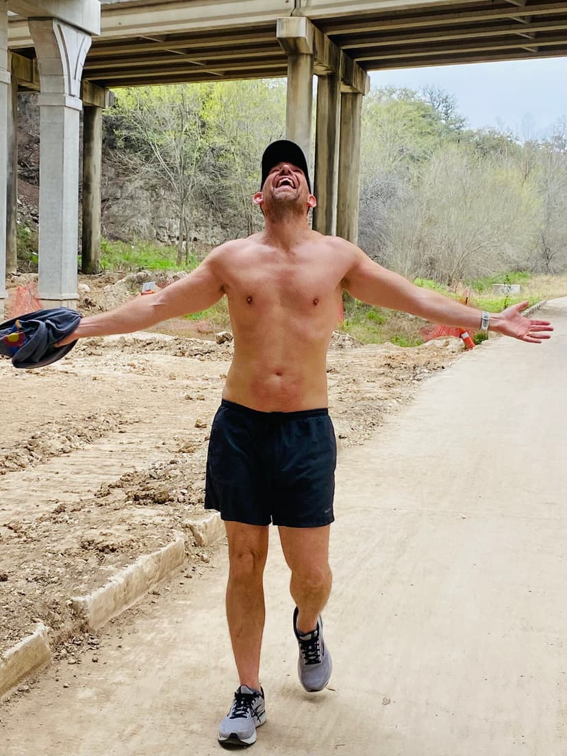 Dr. Dan Foss celebrating at the finish line