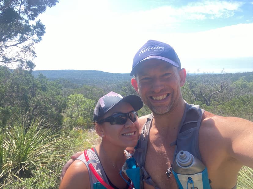Dr. Dan Foss trail running with his wife in the Texas Hill Country